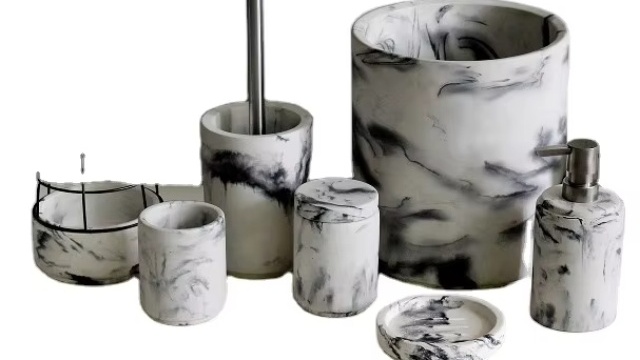 The fusion of ruggedness and delicacy, sturdiness and beauty in cement bathroom accessories